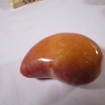 Polished stone fruit - large mango