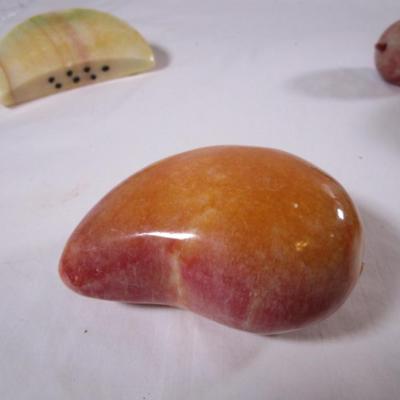 Polished stone fruit - large mango
