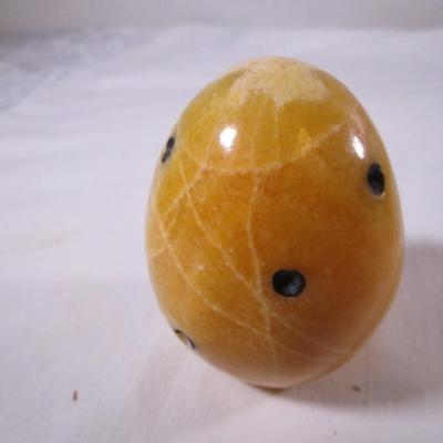 Polished stone fruit - papaya