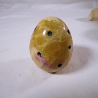 Polished stone fruit - papaya