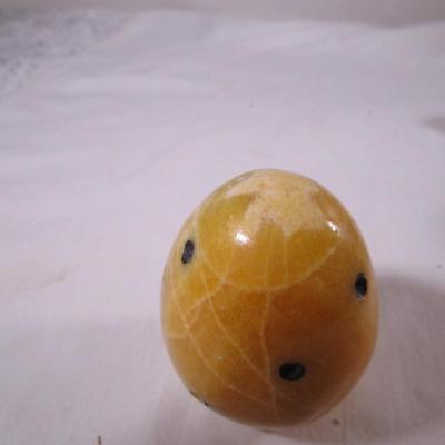 Polished stone fruit - papaya