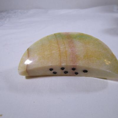 Polished stone fruit - melon slice