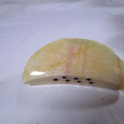 Polished stone fruit - melon slice