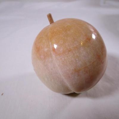 Polished stone fruit - peach