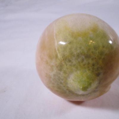 Polished stone fruit - peach