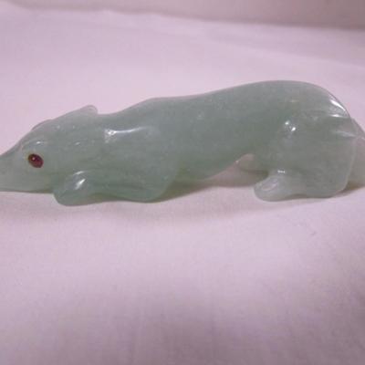 Carved green stone animal, looks like jade