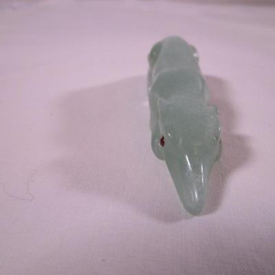 Carved green stone animal, looks like jade
