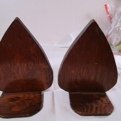 Bookends, with copper sheeting molded with flowers