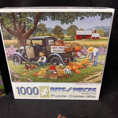 THREE 1000 PIECE JIGSAW PUZZLES