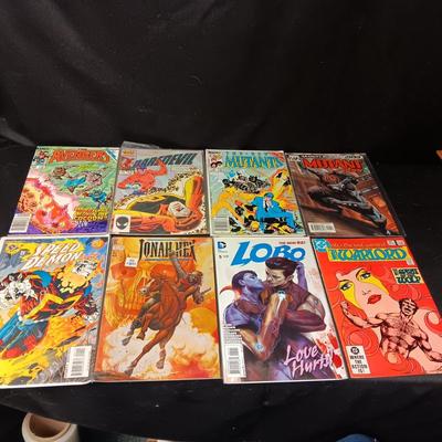 8 COMIC BOOKS (4)