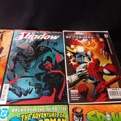 8 COMIC BOOKS (5)