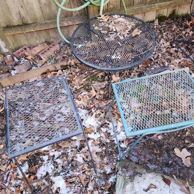 Set of 3 outdoor wrought iron side tables.