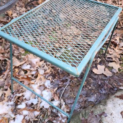 Set of 3 outdoor wrought iron side tables.