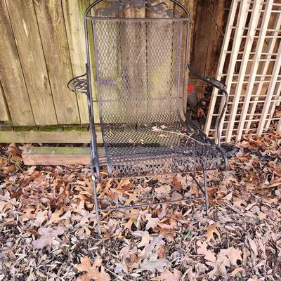 Wrought iron Patio table and 3 chairs.