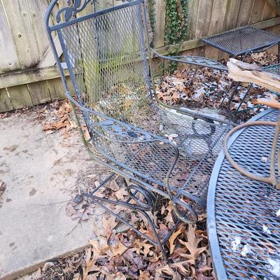 Wrought iron Patio table and 3 chairs.
