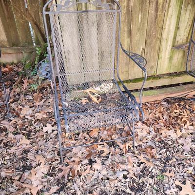 Wrought iron Patio table and 3 chairs.