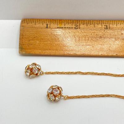 LOT 324: Opera Length Faux Glass Pearls, Lariat Gold Tone Chain with Rhinestones and Four Strand Green Faux Pearls