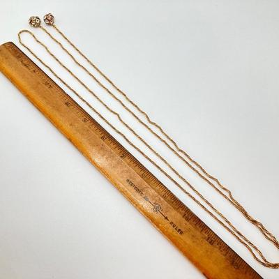 LOT 324: Opera Length Faux Glass Pearls, Lariat Gold Tone Chain with Rhinestones and Four Strand Green Faux Pearls