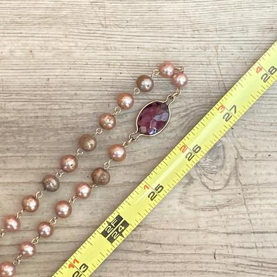 LOT 324: Opera Length Faux Glass Pearls, Lariat Gold Tone Chain with Rhinestones and Four Strand Green Faux Pearls