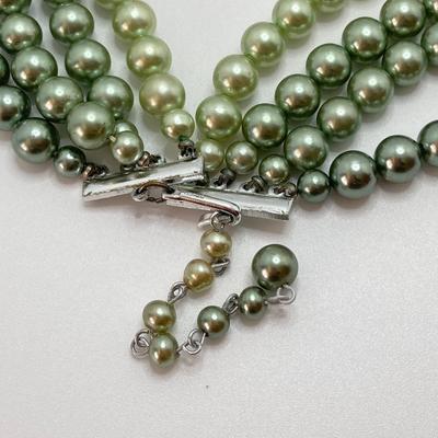 LOT 324: Opera Length Faux Glass Pearls, Lariat Gold Tone Chain with Rhinestones and Four Strand Green Faux Pearls