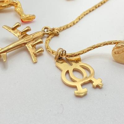 LOT 606: Gold Tone / Gold Plate Jewelry Collection - Monet, Art, Brass Stick Pin and More