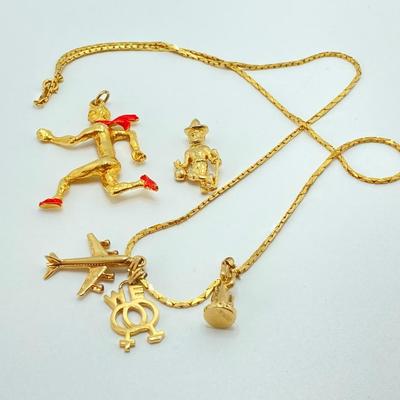 LOT 606: Gold Tone / Gold Plate Jewelry Collection - Monet, Art, Brass Stick Pin and More