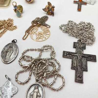 LOT 609: Religious Collection - Stone Pendant w/Gold Tone Chain, Crystal Heart Pendant w/Cross, Red Enamel & Rhinestone Guardian...