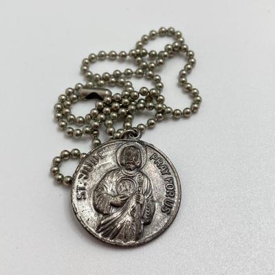 LOT 609: Religious Collection - Stone Pendant w/Gold Tone Chain, Crystal Heart Pendant w/Cross, Red Enamel & Rhinestone Guardian...