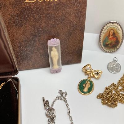 LOT 609: Religious Collection - Stone Pendant w/Gold Tone Chain, Crystal Heart Pendant w/Cross, Red Enamel & Rhinestone Guardian...