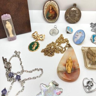 LOT 609: Religious Collection - Stone Pendant w/Gold Tone Chain, Crystal Heart Pendant w/Cross, Red Enamel & Rhinestone Guardian...