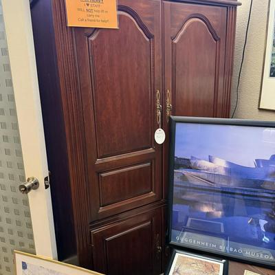 Lot 23: Entertainment Center, Coffee Table & Art