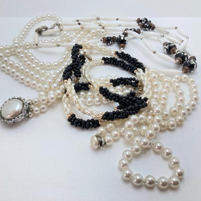 LOT 610: Necklace Collection -Three Strand Faux Pearls, Fresh Water Pearl Bracelet and Necklace and More