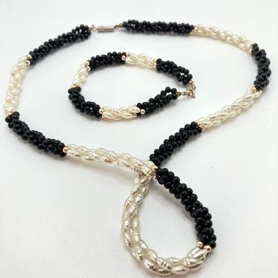 LOT 610: Necklace Collection -Three Strand Faux Pearls, Fresh Water Pearl Bracelet and Necklace and More