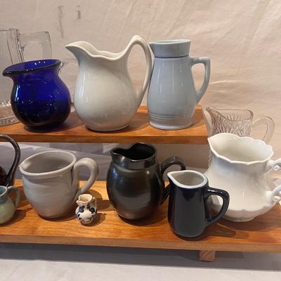 Collection of Creamers with Display Stands (LR-RG)