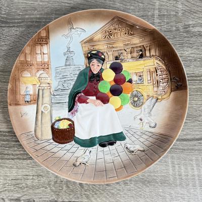 LOT 19D: 1979 Royal Doulton "The Old Balloon Seller" Decorative Plate D6649, 1995 Fitz & Floyd Christmas Cookie Plate,...