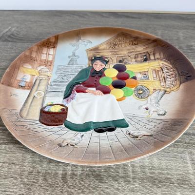 LOT 19D: 1979 Royal Doulton "The Old Balloon Seller" Decorative Plate D6649, 1995 Fitz & Floyd Christmas Cookie Plate,...