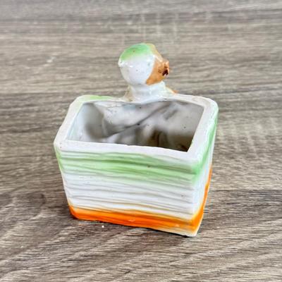 LOT 24D: Figural Planters: Vintage USA Pottery Dutch Girl Watering Flowers, Occupied Japan Children w/ Dog & Boy w/ Log Toothpick Holder