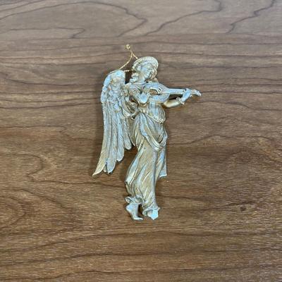 LOT 70D: Various Religious Memorabilia, including a Metal Shrine, Jesus on the Cross, and Porcelain Figurines