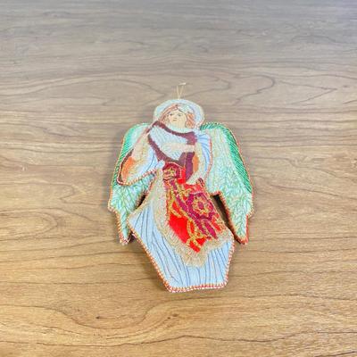 LOT 70D: Various Religious Memorabilia, including a Metal Shrine, Jesus on the Cross, and Porcelain Figurines