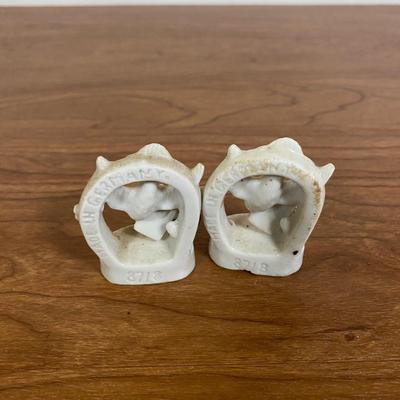 LOT 70D: Various Religious Memorabilia, including a Metal Shrine, Jesus on the Cross, and Porcelain Figurines