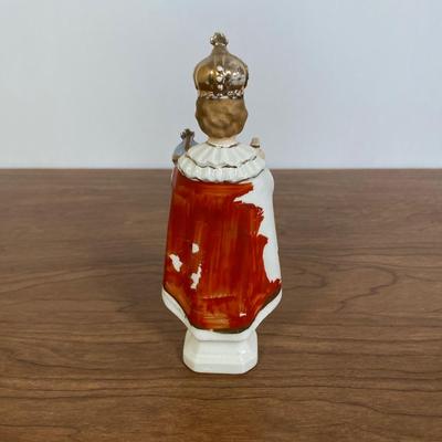 LOT 70D: Various Religious Memorabilia, including a Metal Shrine, Jesus on the Cross, and Porcelain Figurines