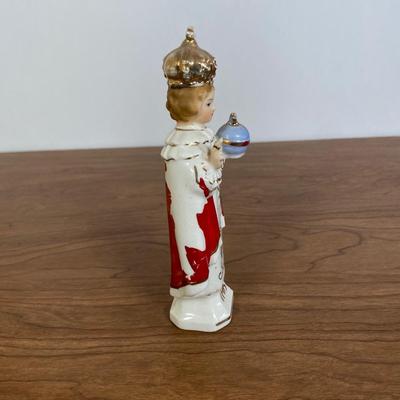 LOT 70D: Various Religious Memorabilia, including a Metal Shrine, Jesus on the Cross, and Porcelain Figurines