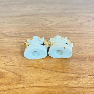 LOT 70D: Various Religious Memorabilia, including a Metal Shrine, Jesus on the Cross, and Porcelain Figurines