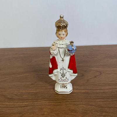 LOT 70D: Various Religious Memorabilia, including a Metal Shrine, Jesus on the Cross, and Porcelain Figurines