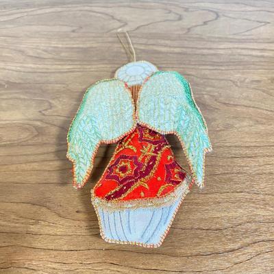 LOT 70D: Various Religious Memorabilia, including a Metal Shrine, Jesus on the Cross, and Porcelain Figurines