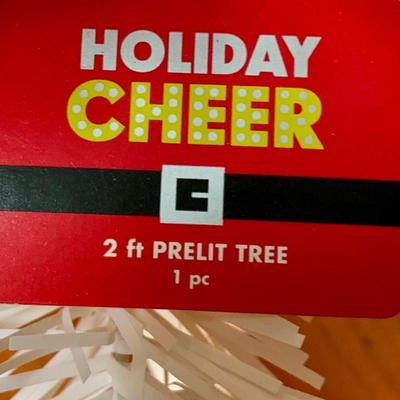 LOT 87 Z: Pair of 2" Pre-lit Christmas Trees