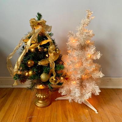 LOT 87 Z: Pair of 2" Pre-lit Christmas Trees