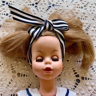 LOT 89 Y: Vintage Articulated Plastic Doll Collection & a Porcelain Dynasty Doll