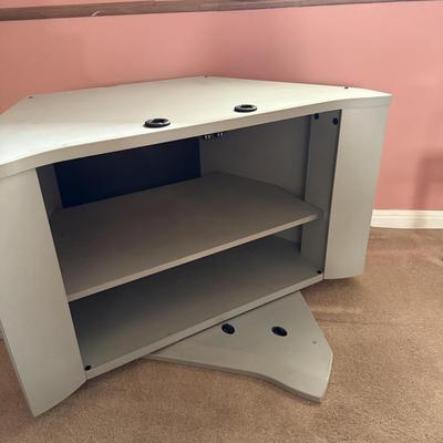 LOT 134L: Tech Craft Corner Swivel TV Stand Model HXS3032