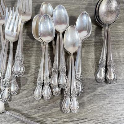 LOT 135K: International Sterling Brocade Silverware Set (1644.6gtw - not including knives)
